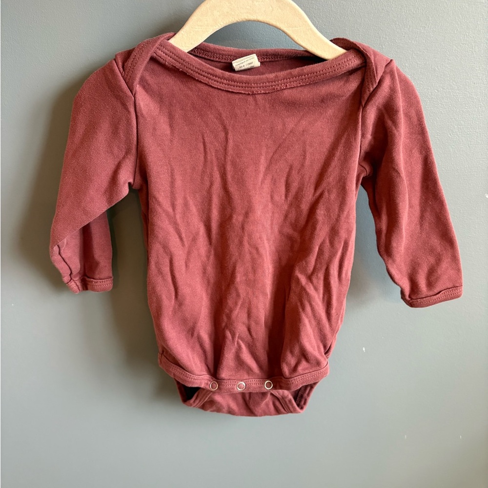 Kate Quinn Long Sleeve Lap Neck Body Suit